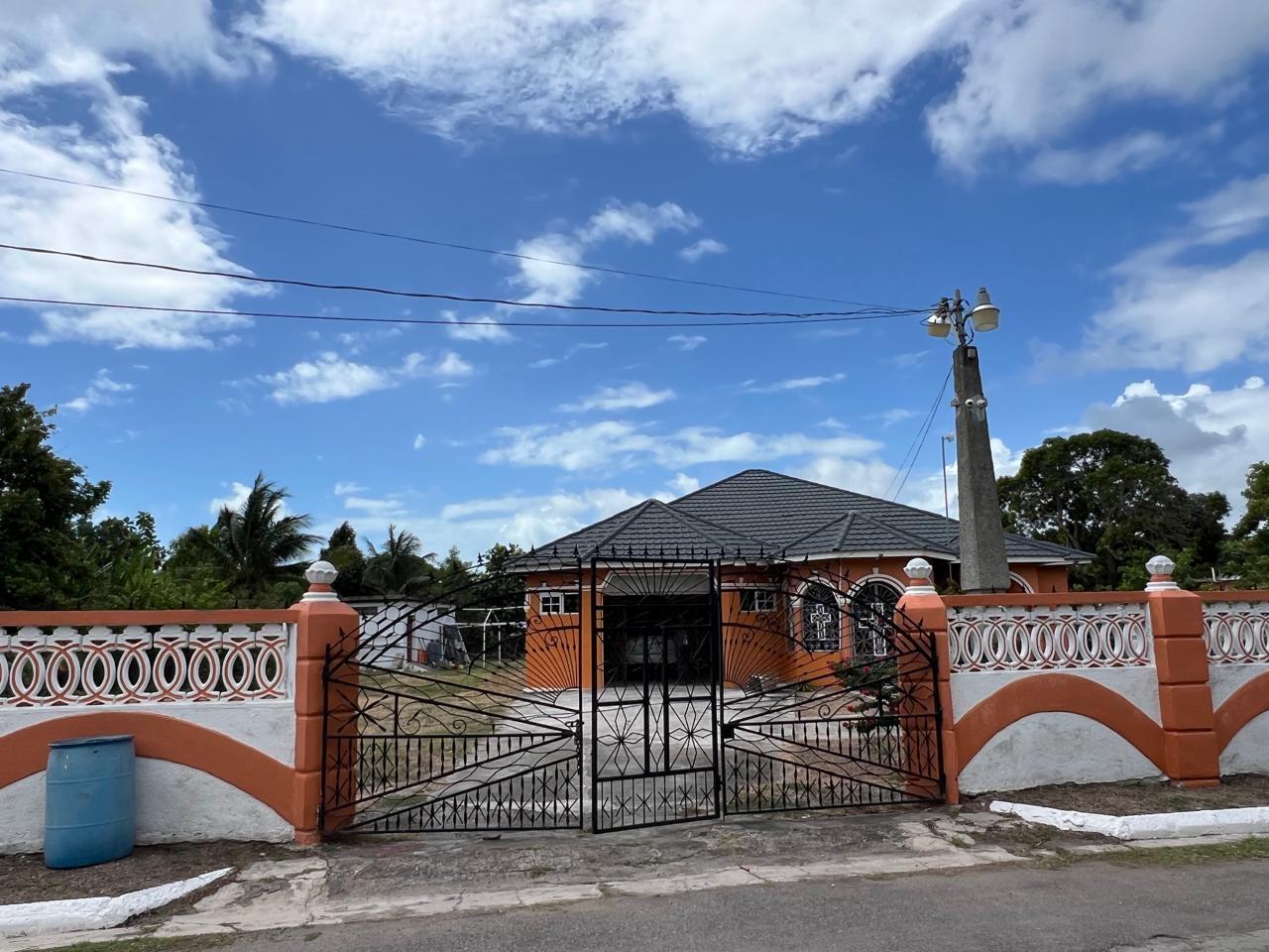 Spacious-4-Bedroom-House-for-Sale-in-Lionel-Town-Clarendon-–-Secure-Solar-Powered First image of 23 Armstrong Drive in Lionel Town, Clarendon, Jamaica - property is For Sale