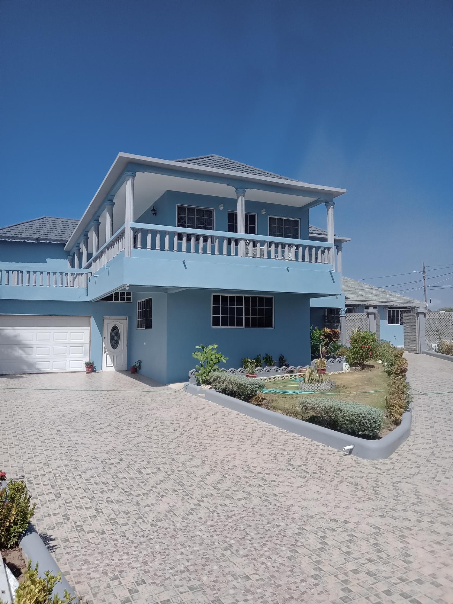 Spacious-6-Bedroom-Family-Home-for-Sale-in-St.-Catherine-Jamaica-Sea-Views-Modern-Comforts Fifth image of Lot 101 Ball Plate Circle, st Geo in HELLSHIRE HILLS, St. Catherine, Jamaica - property is For Sale