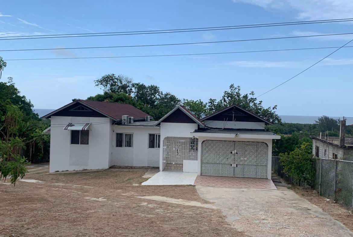 Fourth image of 408 Greenwood Avenue in Rose Hall, St. James, Jamaica - property is For Sale