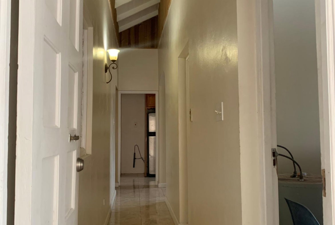 Seventh image of 408 Greenwood Avenue in Rose Hall, St. James, Jamaica - property is For Sale
