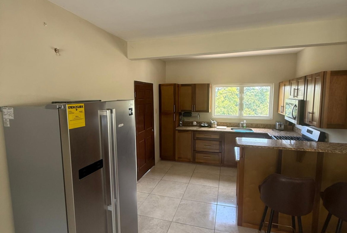 Sixteenth image of 302-1 Belair Avenue in Kingston 3, St. Andrew, Jamaica - property is For Rent