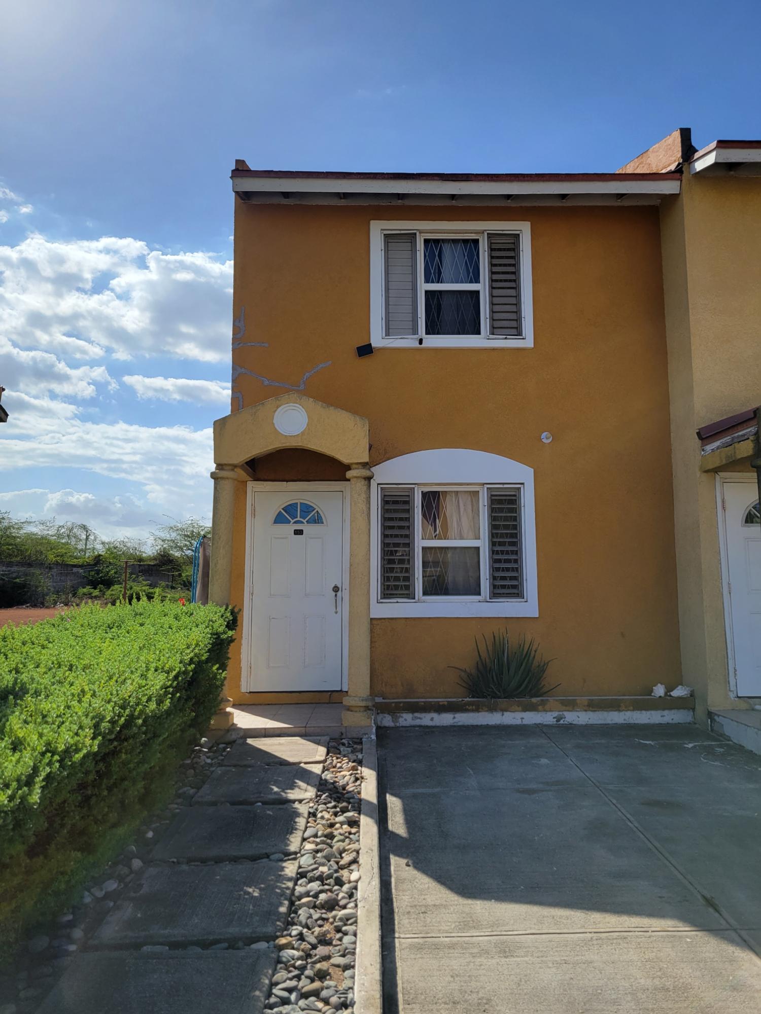 Townhouse-for-Sale-in-St.-Catherine-Jamaica-2-Bedroom-Gated-Community-Home First image of 153 Leslie Close in Unions Estate, St. Catherine, Jamaica - property is For Sale
