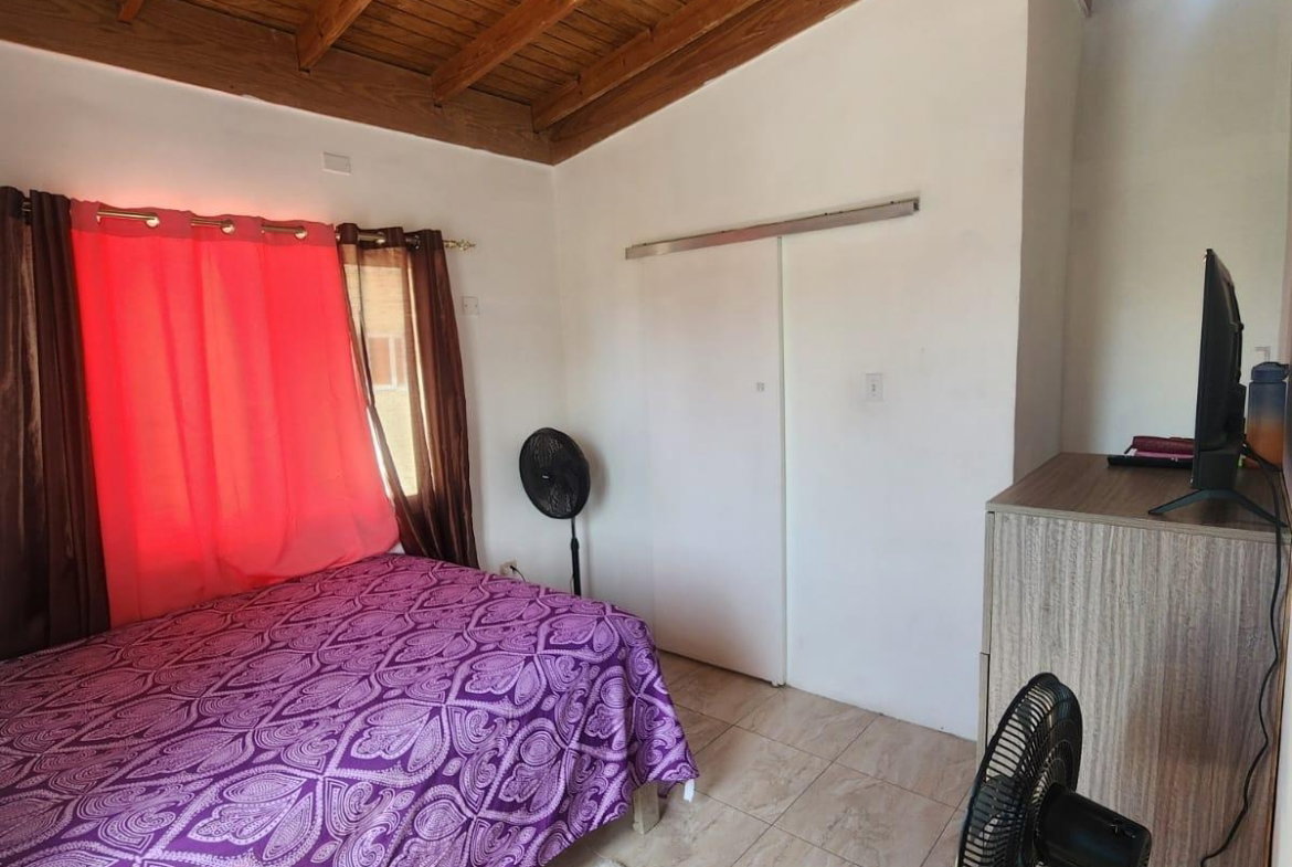 Ninth image of 217 Delacree Pen St. Andrew in Kingston 13, St. Andrew, Jamaica - property is For Sale