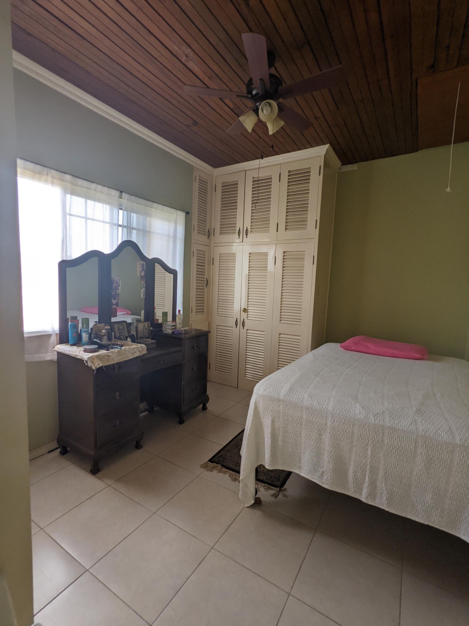 Beautiful-4-Bedroom-House-for-Sale-in-St.-Mary-Jamaica-–-Sea-Views-Fruit-Yard Thirteenth image of 112 Rio Nuevo Circle, St. Mar in Tower Isle, St. Mary, Jamaica - property is For Sale