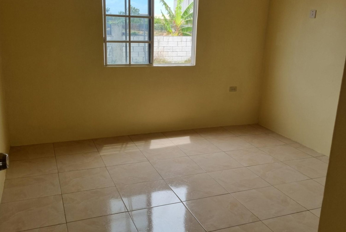 First image of 1218-54 Phoenix Boulevard in Phoenix Park, St. Catherine, Jamaica - property is For Rent