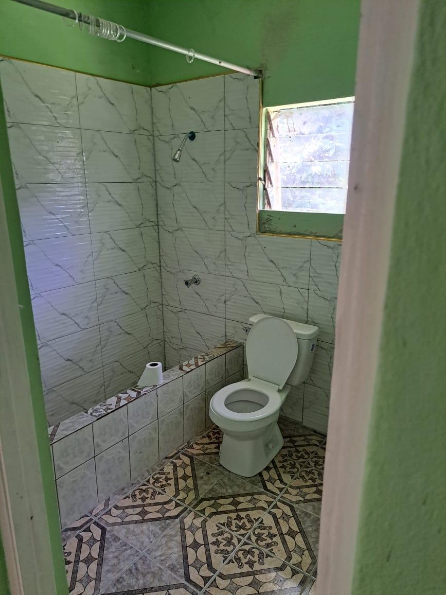 Cozy-3-Bedroom-House-for-Sale-in-Trelawny-Jamaica-–-Great-Starter-or-Investment-Property Fourteenth image of Lot Part of Hyde & Gibral in Clarks Town, Trelawny, Jamaica - property is For Sale