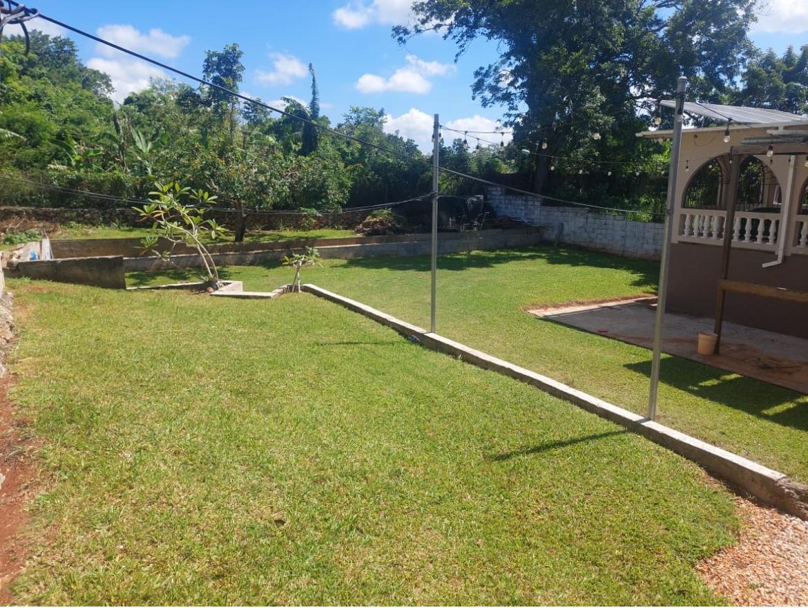 Spacious-5-Bedroom-House-for-Sale-in-Dunsinane-Hatfield-Manchester-Jamaica Second image of 13 Olliando Rise in Hatfield, Manchester, Jamaica - property is For Sale