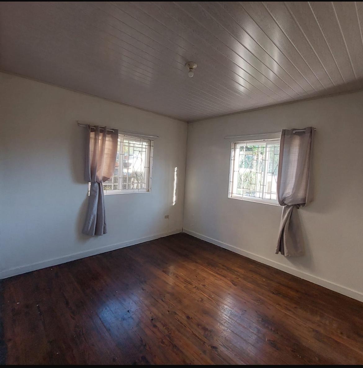 Spacious-5-Bedroom-House-for-Sale-in-Dunsinane-Hatfield-Manchester-Jamaica Thirteenth image of 13 Olliando Rise in Hatfield, Manchester, Jamaica - property is For Sale