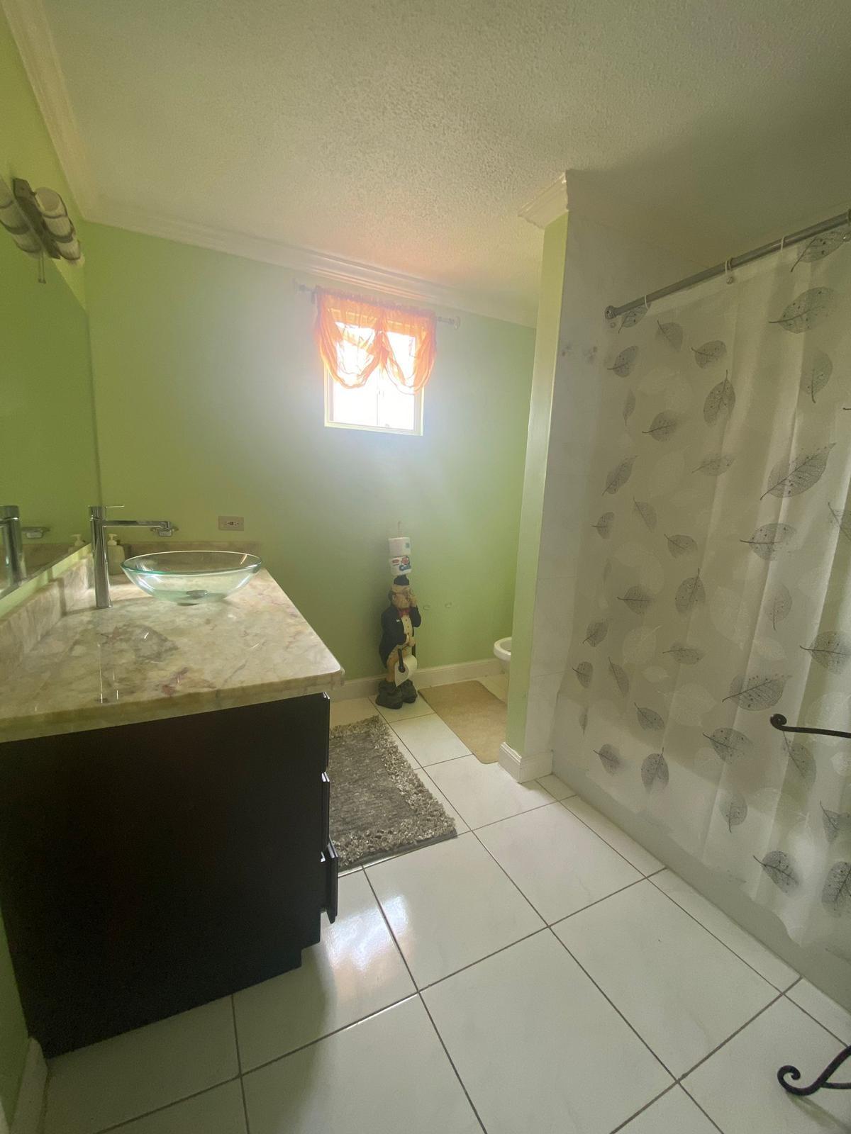 Furnished-2-Bedroom-Townhouse-for-Rent-in-Mango-Walk-Country-Club-Montego-Bay Tenth image of 8 Bombay Boulevard in Montego Bay, St. James, Jamaica - property is For Rent