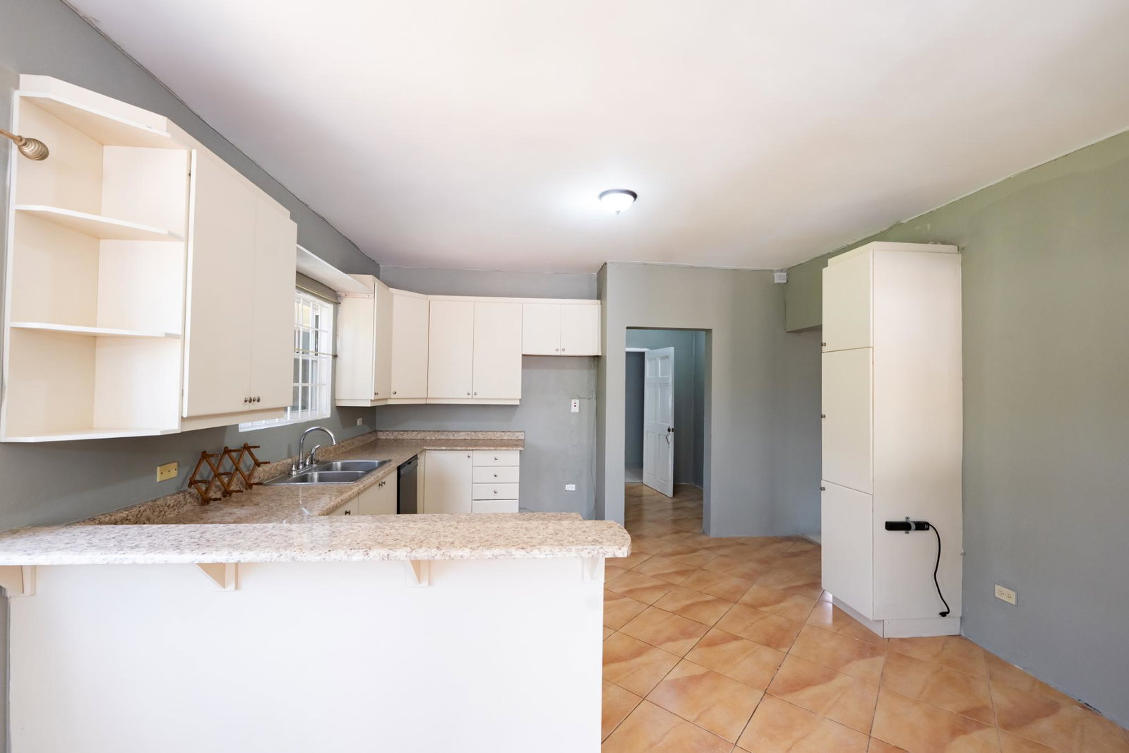 Fourteenth image of 215 Sandhills Circle in HELLSHIRE HILLS, St. Catherine, Jamaica - property is For Rent