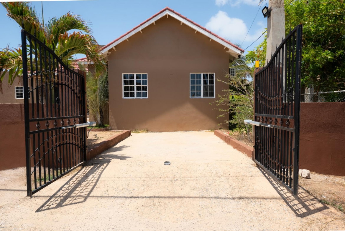 Fourth image of 215 Sandhills Circle in HELLSHIRE HILLS, St. Catherine, Jamaica - property is For Rent