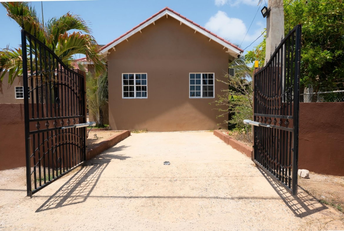 Fourth image of 215 Sandhills Circle in HELLSHIRE HILLS, St. Catherine, Jamaica - property is For Sale