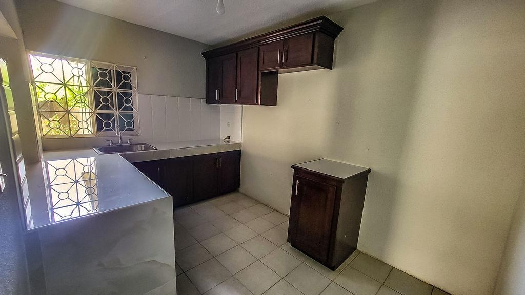 Seventh image of Phoenix Avenue in Westgate Hills, St. James, Jamaica - property is For Sale
