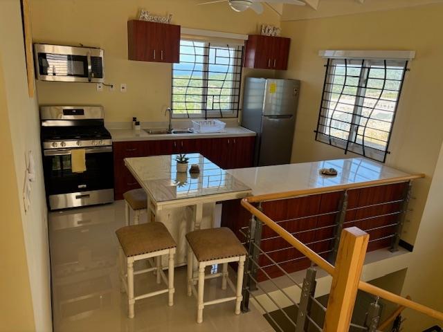 Tenth image of 123 Edmund Ridge Estaes in SPOT VALLEY, St. James, Jamaica - property is For Rent