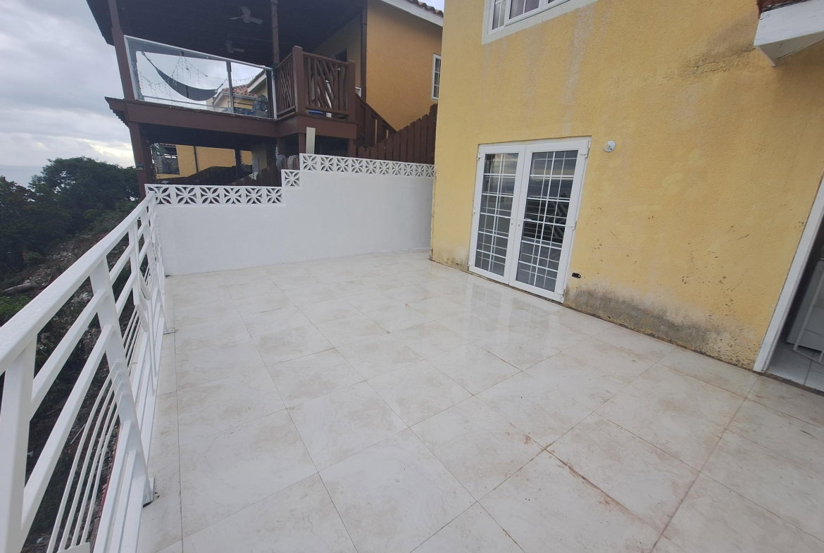 Twelfth image of 54 Poui Circle, Mango Walk c in Mango Walk C-Club, St. James, Jamaica - property is For Rent