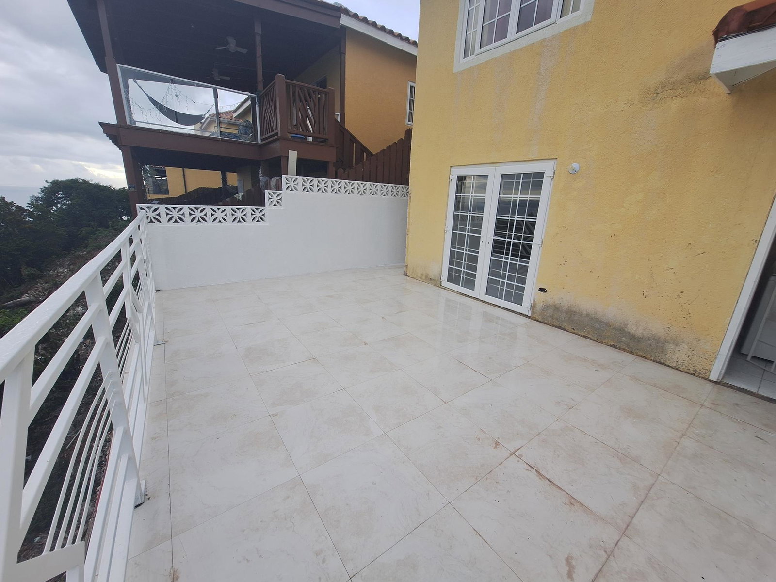 Twelfth image of 54 Poui Circle, Mango Walk c in Mango Walk C-Club, St. James, Jamaica - property is For Rent