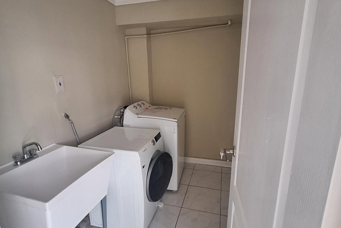 Thirteenth image of 54 Poui Circle, Mango Walk c in Mango Walk C-Club, St. James, Jamaica - property is For Rent