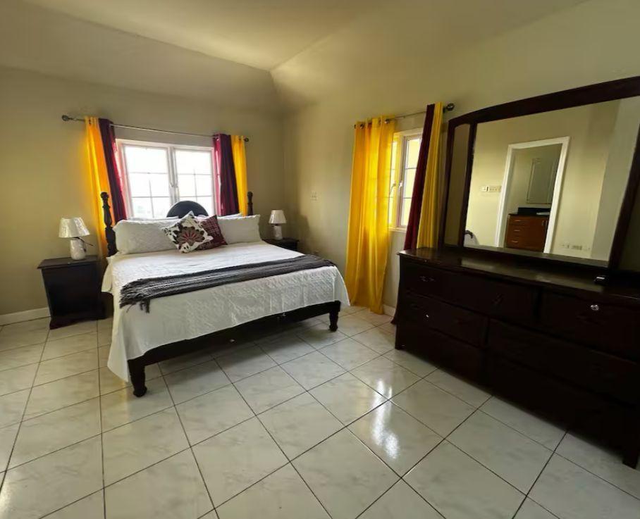 Fourteenth image of 54 Poui Circle, Mango Walk c in Mango Walk C-Club, St. James, Jamaica - property is For Rent