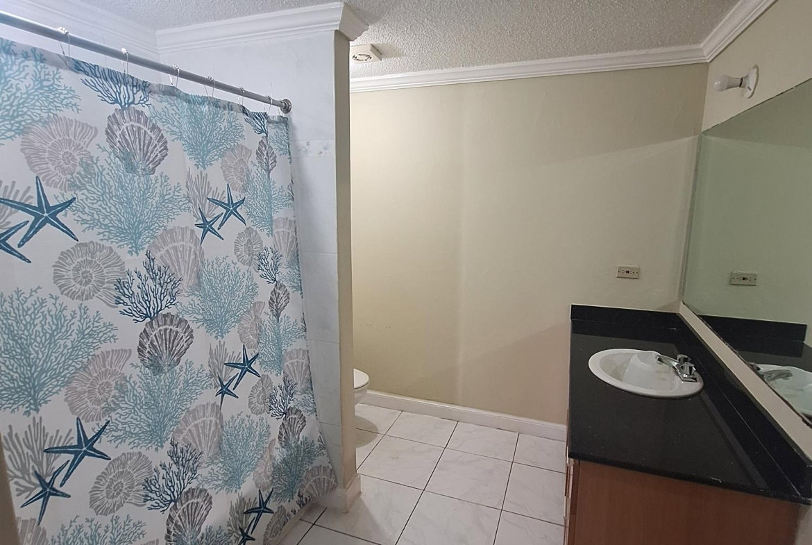 Fifteenth image of 54 Poui Circle, Mango Walk c in Mango Walk C-Club, St. James, Jamaica - property is For Rent