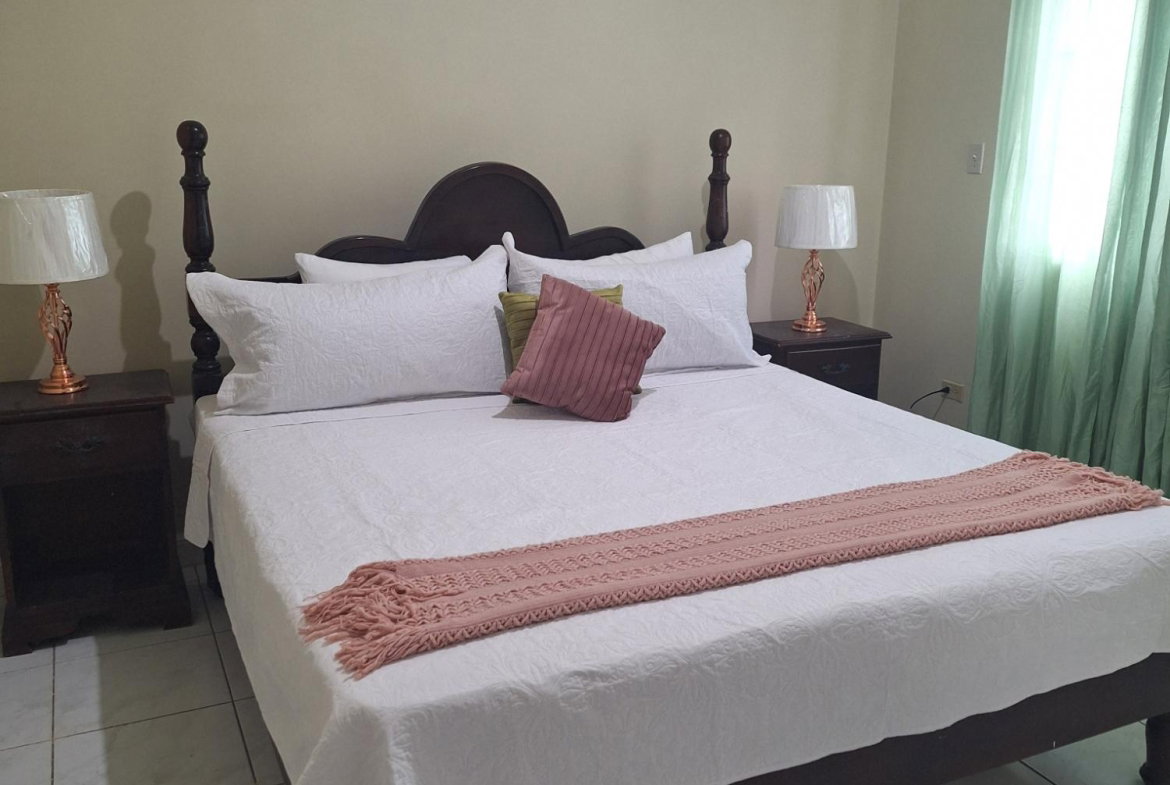 Sixteenth image of 54 Poui Circle, Mango Walk c in Mango Walk C-Club, St. James, Jamaica - property is For Rent