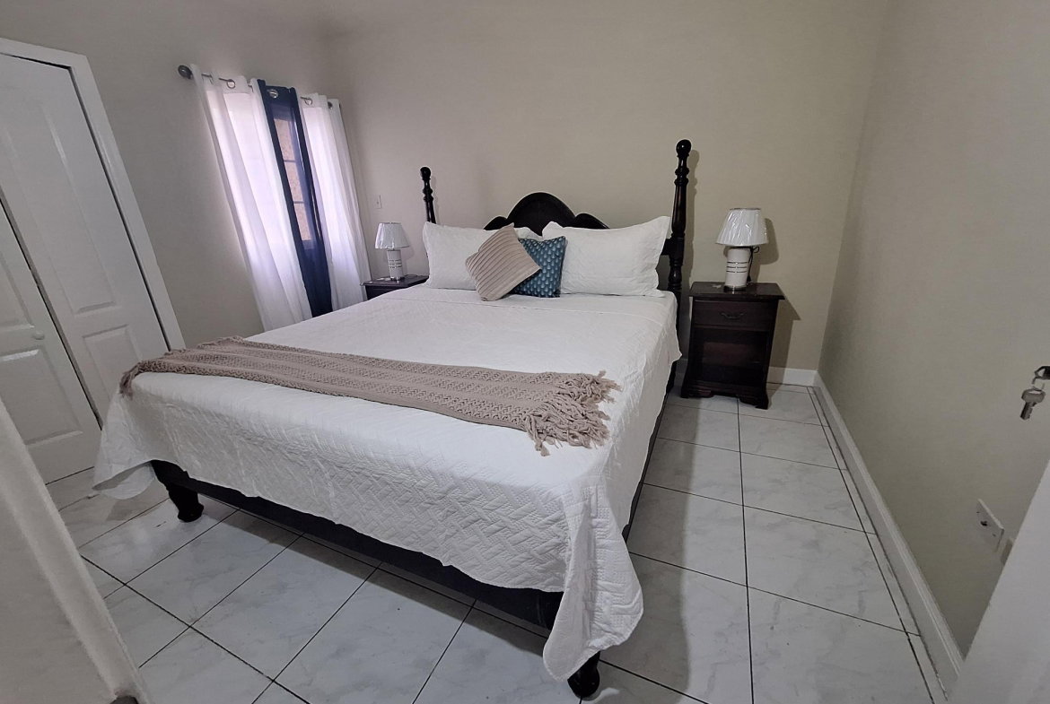Seventeenth image of 54 Poui Circle, Mango Walk c in Mango Walk C-Club, St. James, Jamaica - property is For Rent