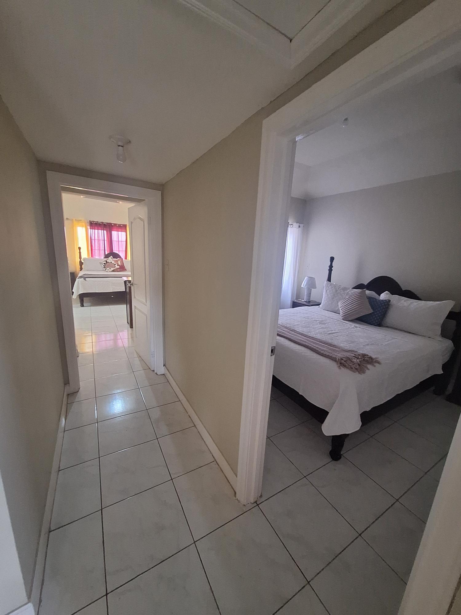 Eighteenth image of 54 Poui Circle, Mango Walk c in Mango Walk C-Club, St. James, Jamaica - property is For Rent