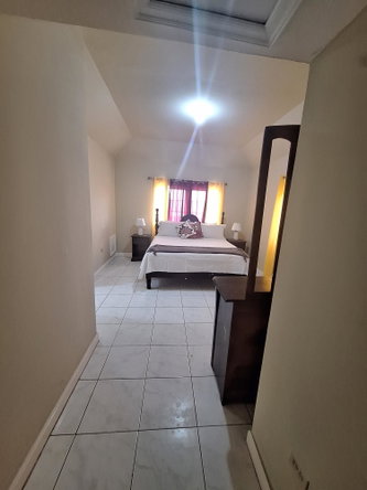 Nineteenth image of 54 Poui Circle, Mango Walk c in Mango Walk C-Club, St. James, Jamaica - property is For Rent