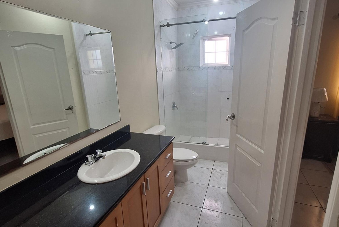 Twenty-First image of 54 Poui Circle, Mango Walk c in Mango Walk C-Club, St. James, Jamaica - property is For Rent