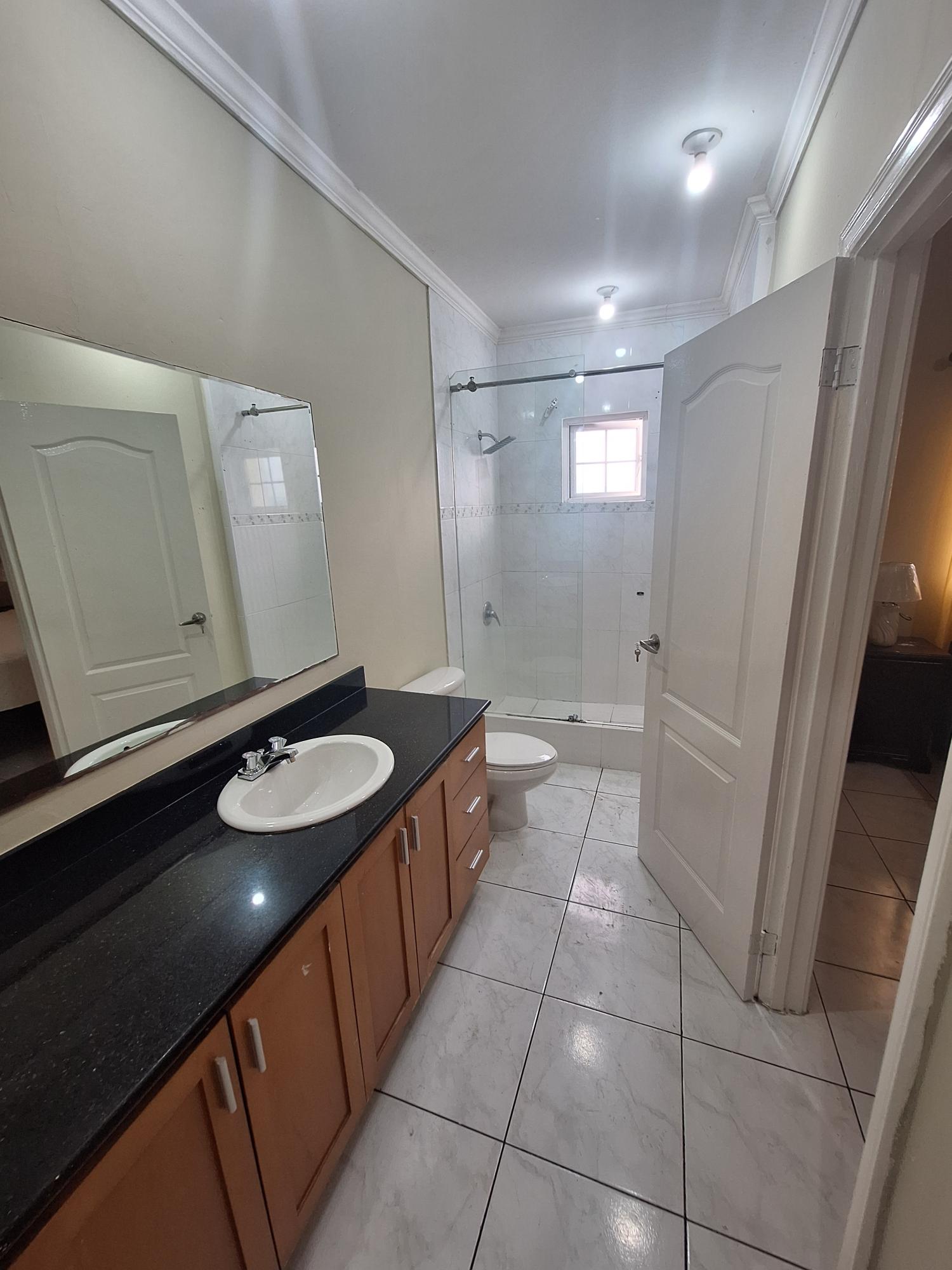 Twenty-First image of 54 Poui Circle, Mango Walk c in Mango Walk C-Club, St. James, Jamaica - property is For Rent