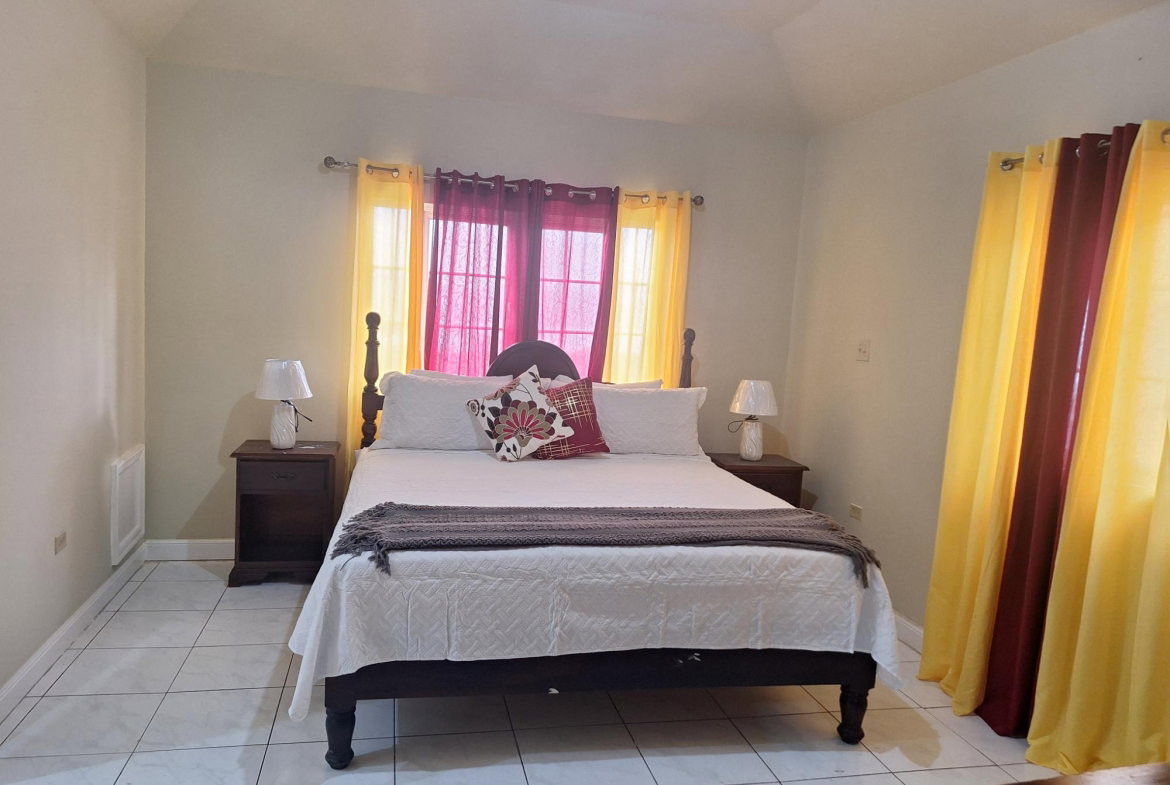 Twenty-Second image of 54 Poui Circle, Mango Walk c in Mango Walk C-Club, St. James, Jamaica - property is For Rent