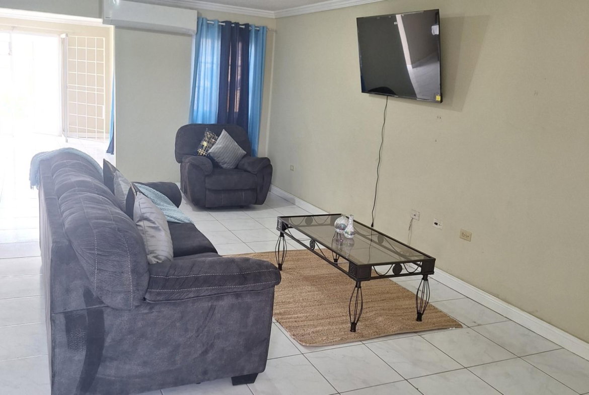 Fifth image of 54 Poui Circle, Mango Walk c in Mango Walk C-Club, St. James, Jamaica - property is For Rent
