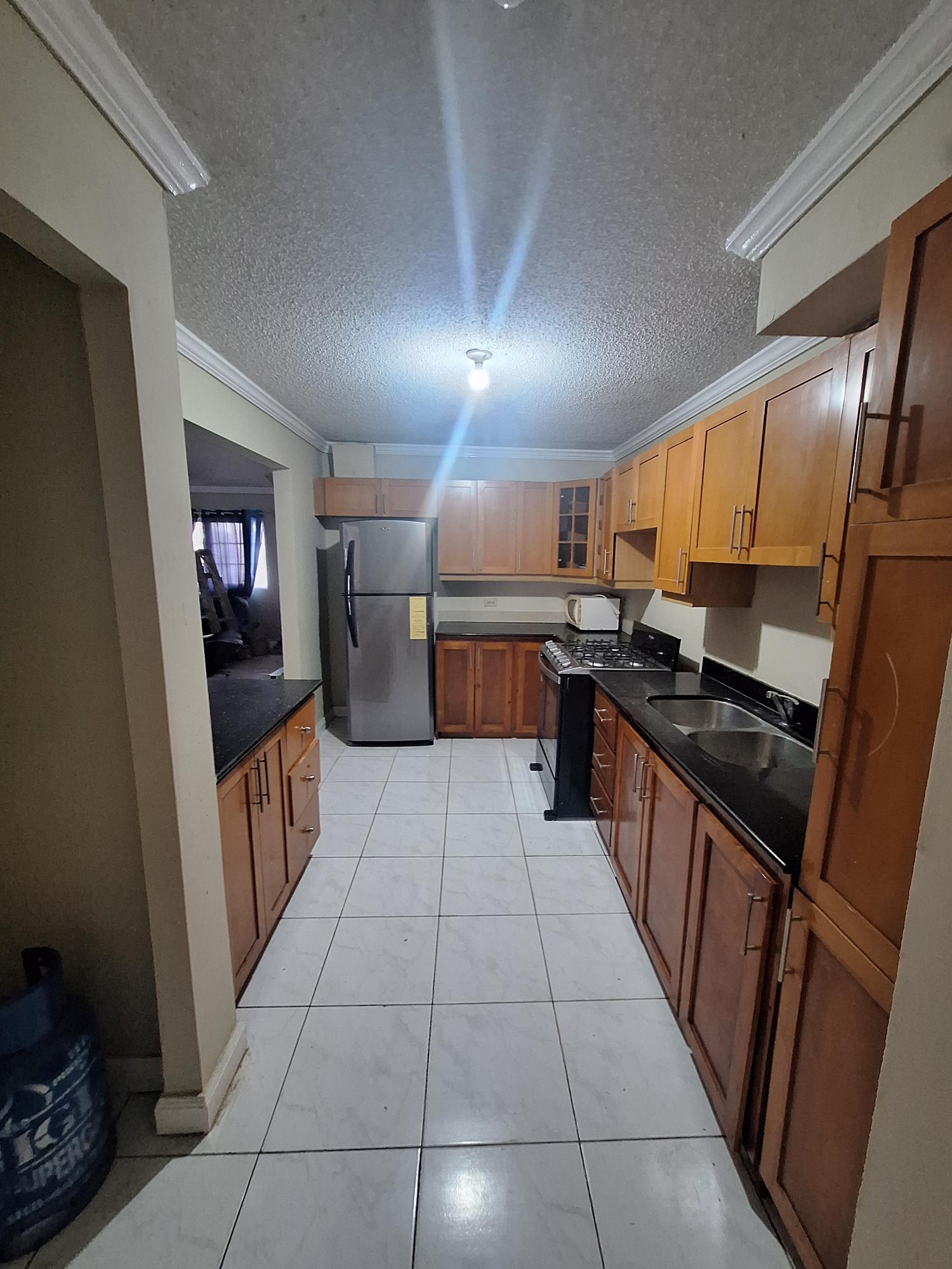 Ninth image of 54 Poui Circle, Mango Walk c in Mango Walk C-Club, St. James, Jamaica - property is For Rent