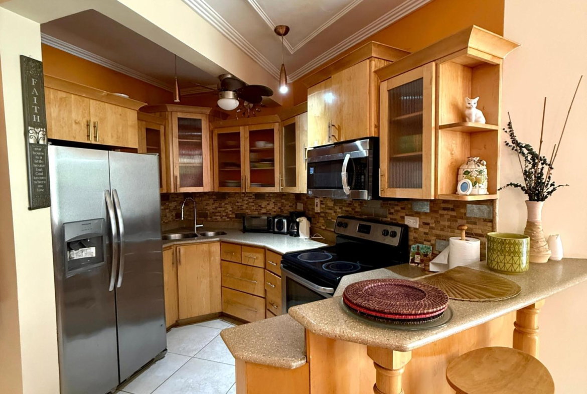Fourth image of Spathodia Avenue, Mona he in Kingston 6, St. Andrew, Jamaica - property is For Rent