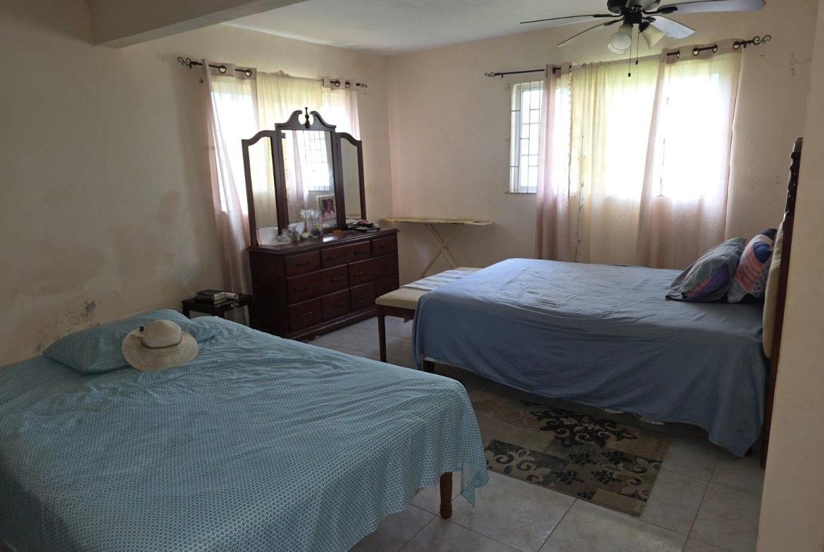 Sixteenth image of 860 Upper Deck Avenue Porto b in Sign, St. James, Jamaica - property is For Sale