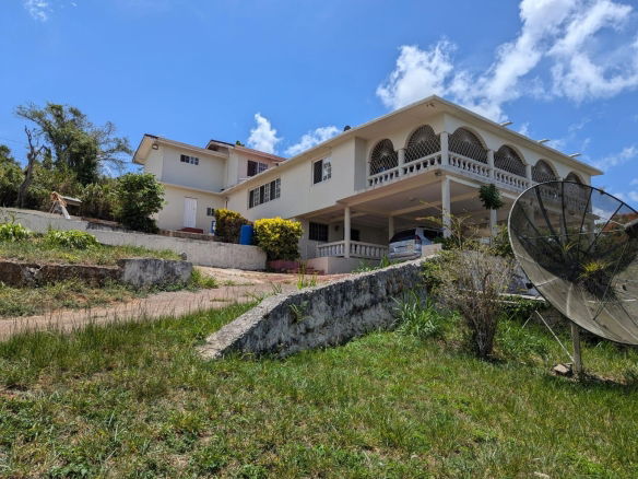 Spacious 4-Bedroom House for Sale in Spur Tree, Manchester, Jamaica 3 First image of Lot 36 Spur Tree in Spur Tree, Manchester, Jamaica - property is For Sale