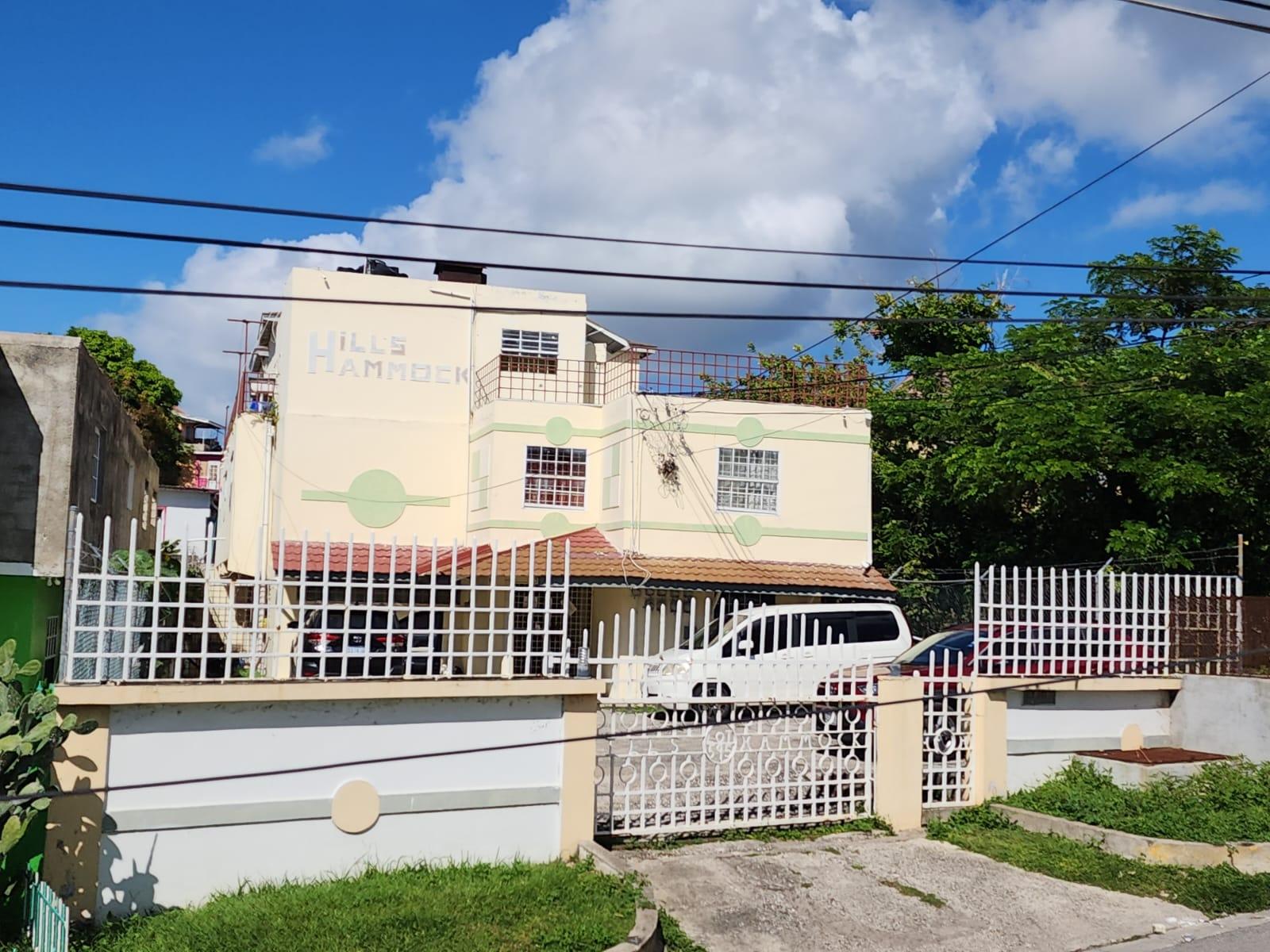 Turnkey-Apartment-Building-for-Sale-in-Farm-Heights-Montego-Bay-–-Prime-Investment-Opportunity First image of 595 Farm Pen in Farm Heights, St. James, Jamaica - property is For Sale
