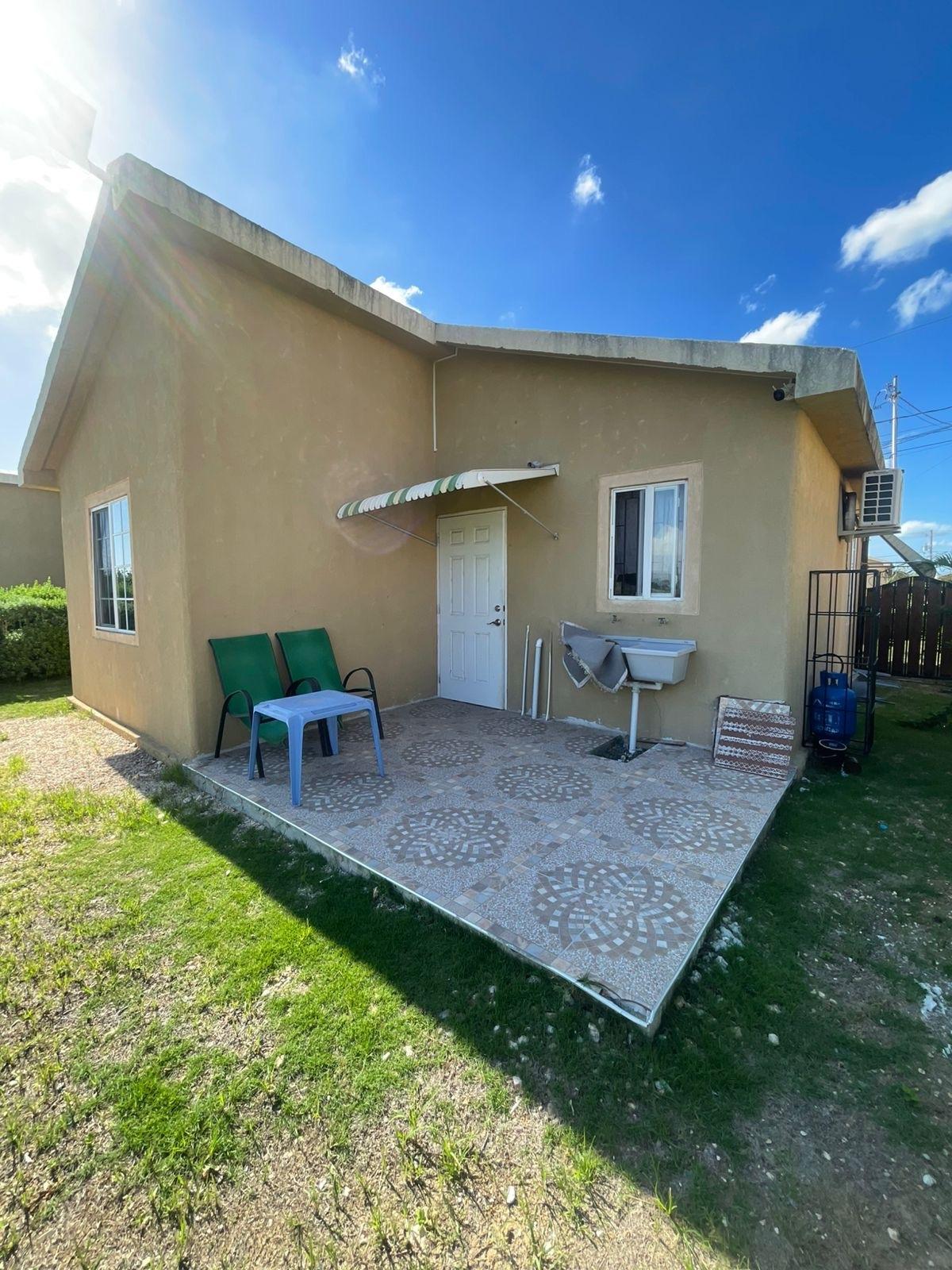 Charming-2-Bedroom-House-for-Rent-in-Phoenix-Village-St.-Catherine-Jamaica First image of 1317 Pheonix Park Village ph in SALT ISLAND PEN, St. Catherine, Jamaica - property is For Rent