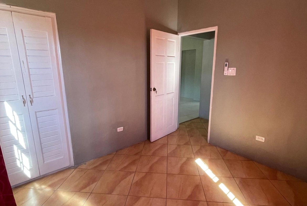 Thirteenth image of 215 Sandhills Circle, Hellshi in Hellshire Heights, St. Catherine, Jamaica - property is For Rent