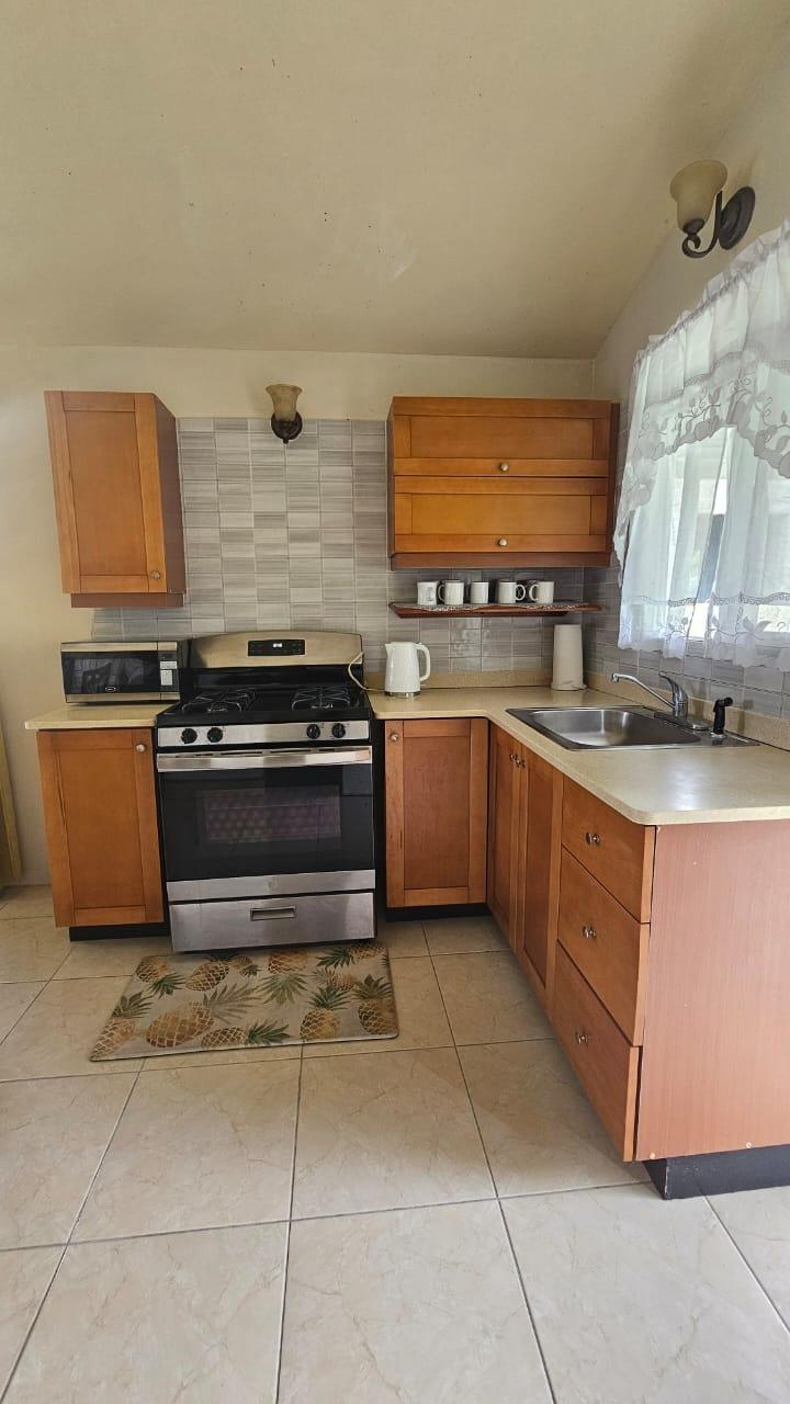 Third image of 61 Montego West Village in Granville, St. James, Jamaica - property is For Rent