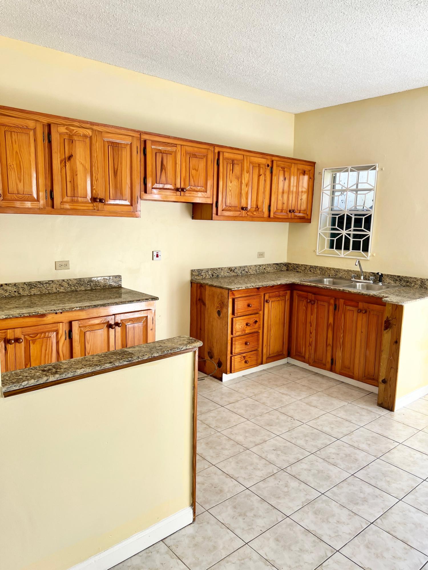 2-Bedroom-Townhouse-for-Rent-in-Pines-of-Karachi-St.-Andrew-Jamaica Second image of 22- Cedar Close in Kingston 6, St. Andrew, Jamaica - property is For Rent