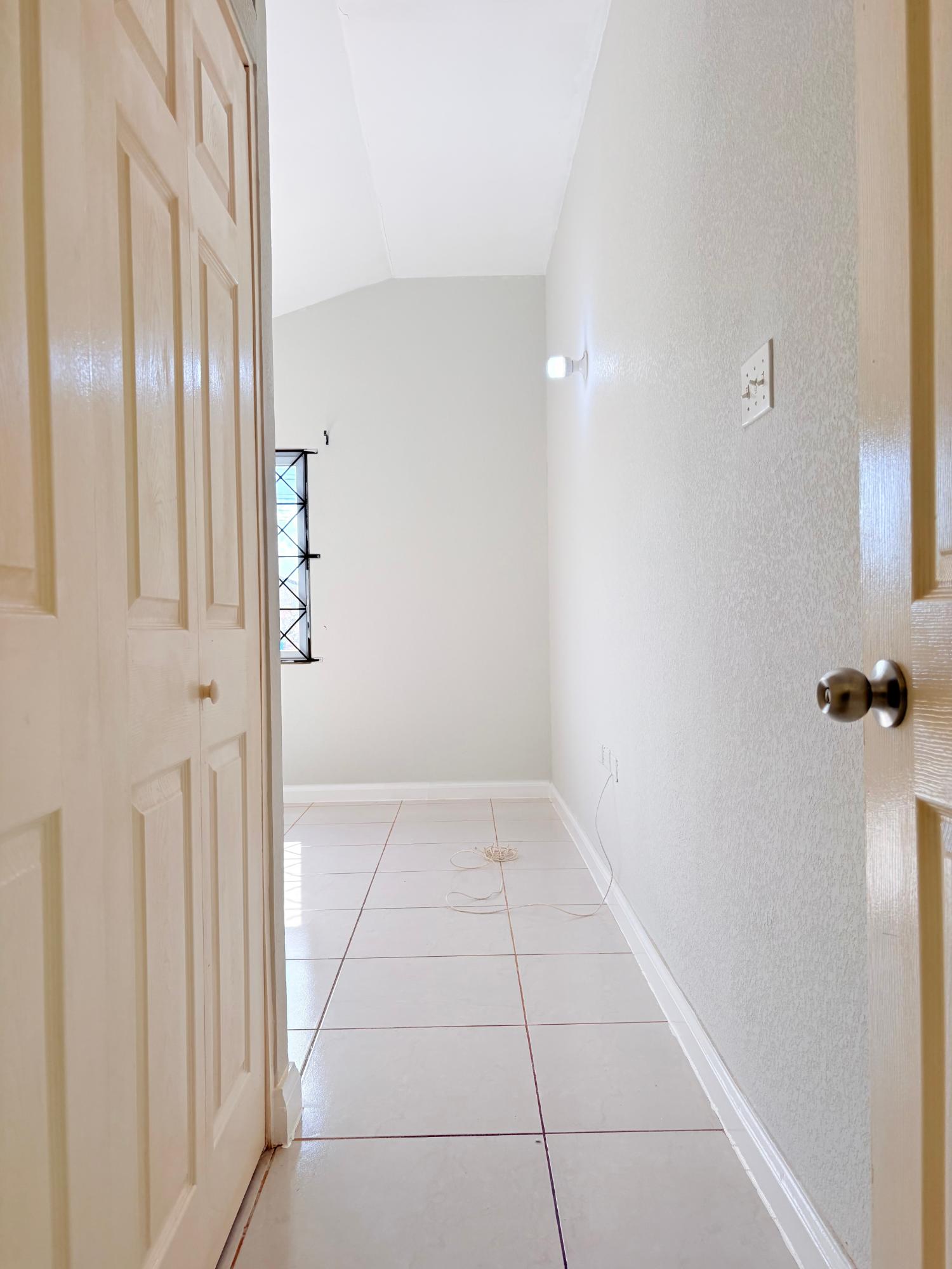 Charming-2-Bedroom-House-for-Rent-in-St.-Catherine-Jamaica-441-Castle-Run-Ave Sixth image of 441 Castle Run Avenue in Spanish Town, St. Catherine, Jamaica - property is For Rent