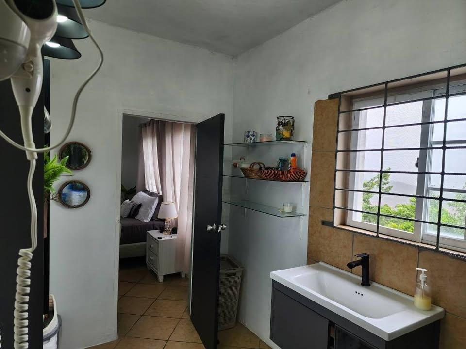 Nineteenth image of 17 Research Terrace in Battersea, Manchester, Jamaica - property is For Rent