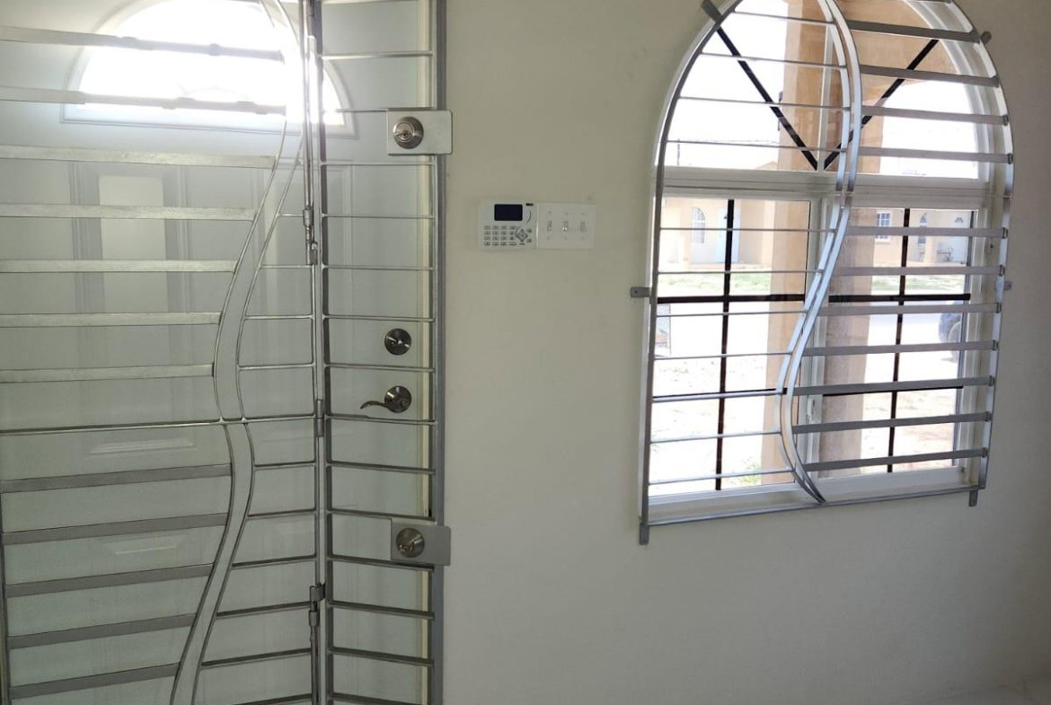 First image of 904 Violet Crescent in Phoenix Park, St. Catherine, Jamaica - property is For Rent