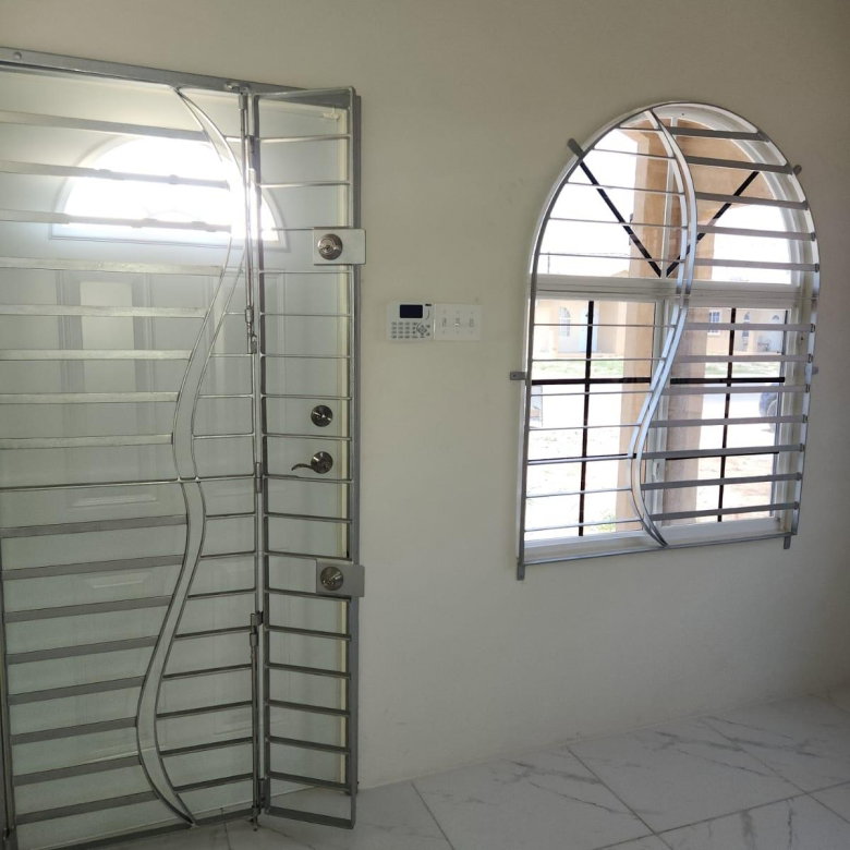 First image of 904 Violet Crescent in Phoenix Park, St. Catherine, Jamaica - property is For Rent