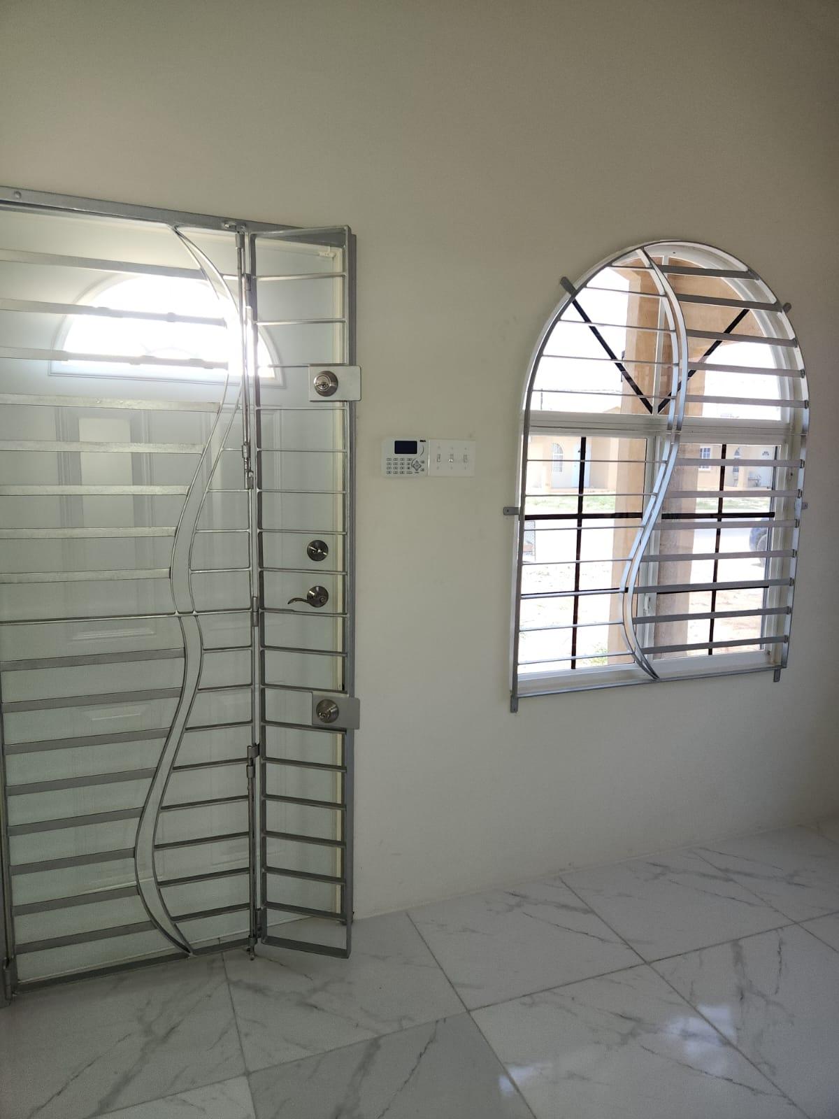 First image of 904 Violet Crescent in Phoenix Park, St. Catherine, Jamaica - property is For Rent