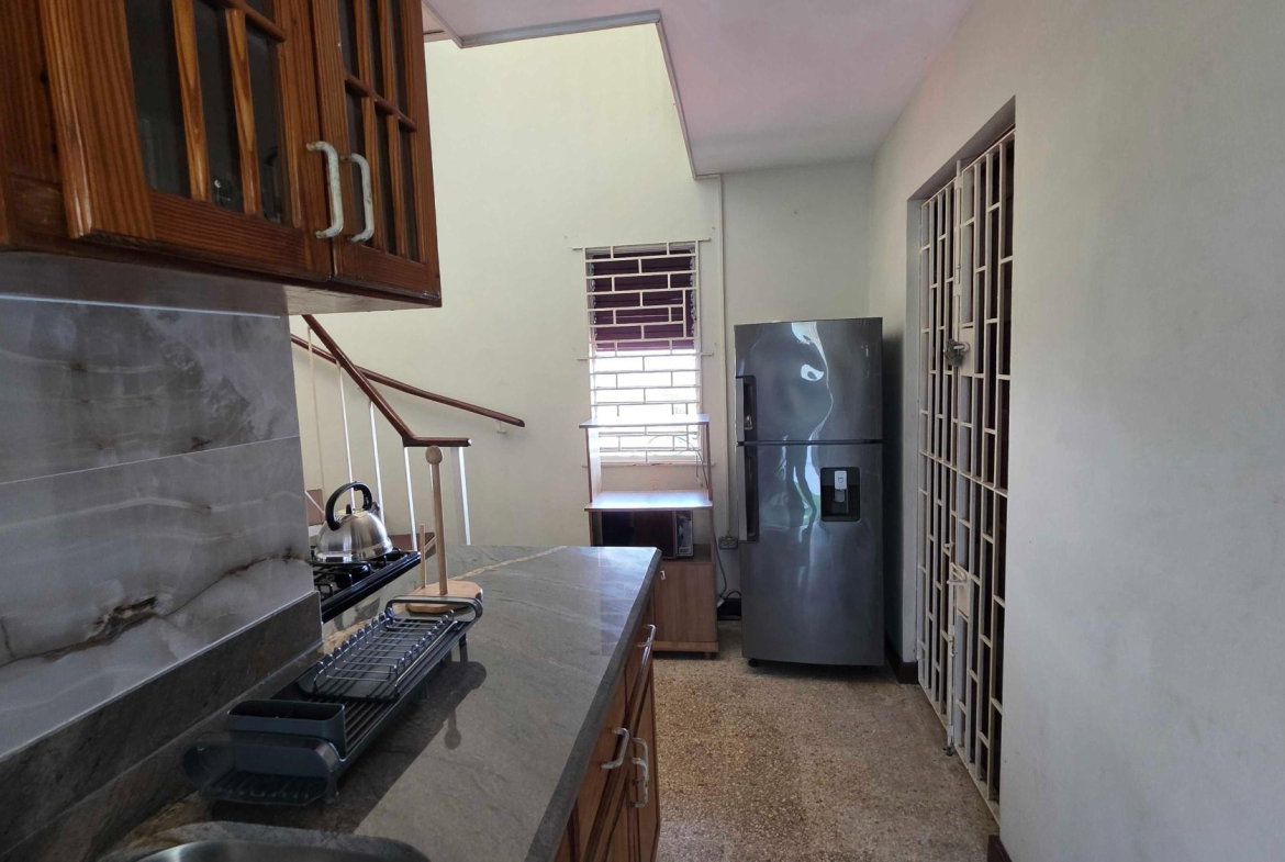 Sixteenth image of Morningside dr in Rosemount, St. James, Jamaica - property is For Rent