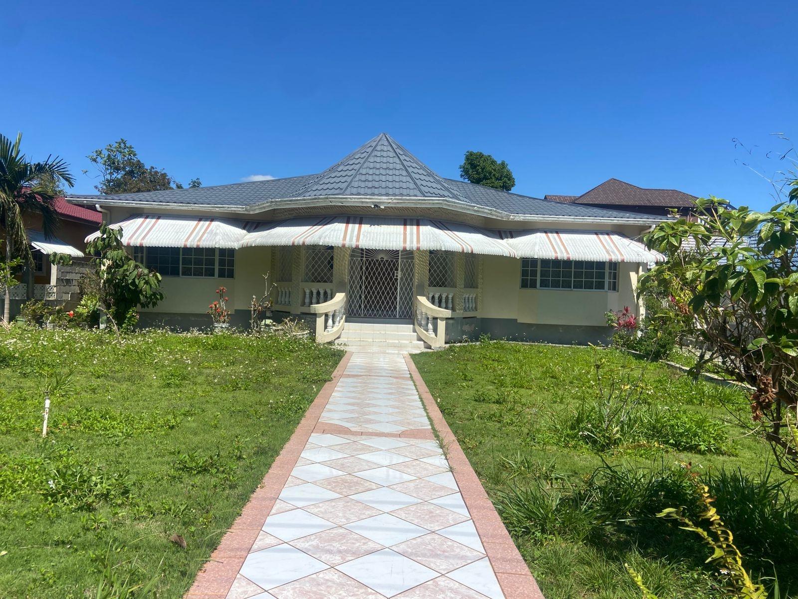 Charming-4-Bedroom-Bungalow-for-Sale-in-Manchester-Jamaica-10-West-Road First image of 10 West Road, Lot 4 in Mandeville, Manchester, Jamaica - property is For Sale