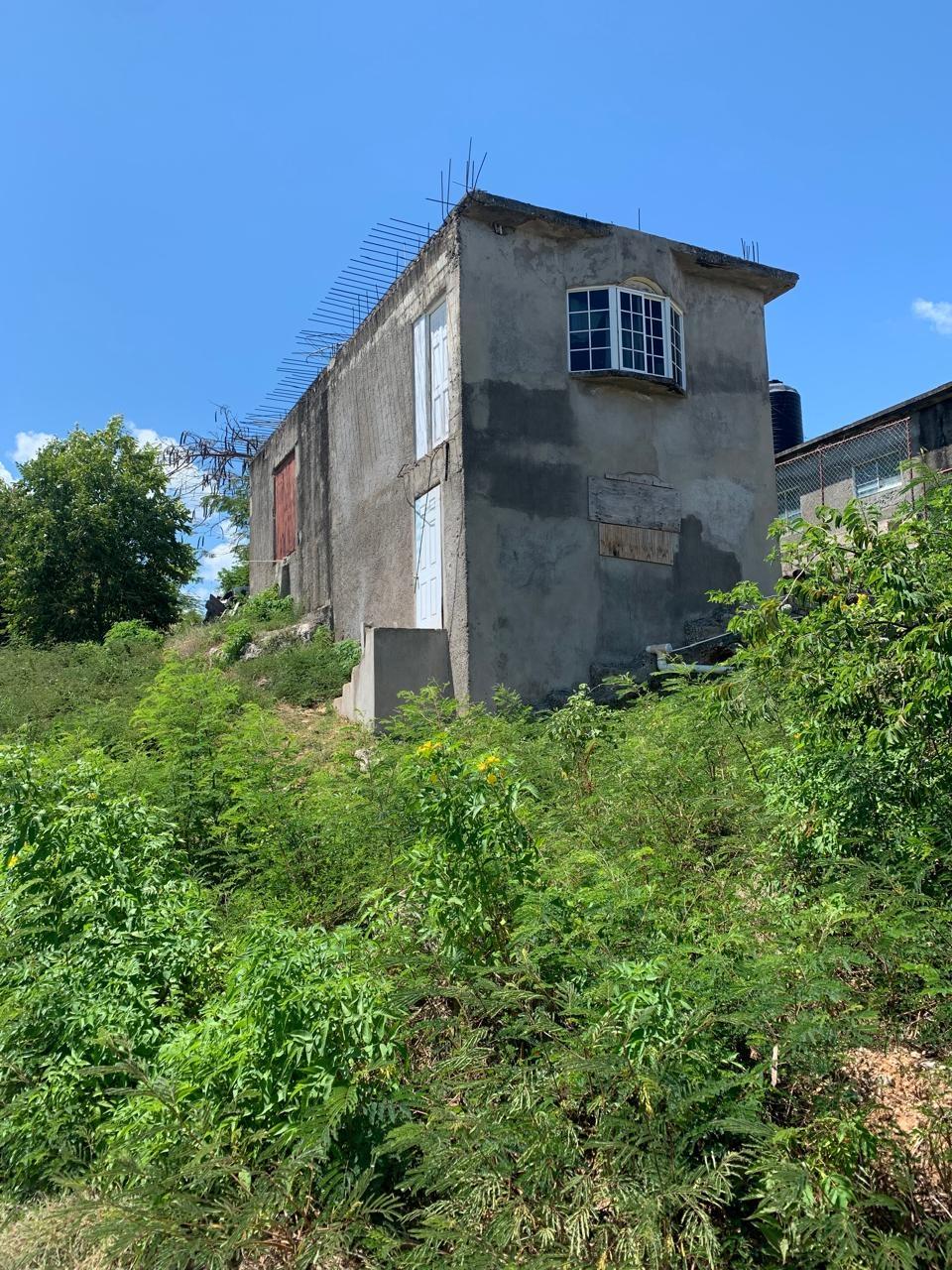 Charming-Split-Level-House-for-Sale-in-Bushy-Park-Clarendon-Jamaica First image of 498 Pimento Drive in Bushy Park, Clarendon, Jamaica - property is For Sale