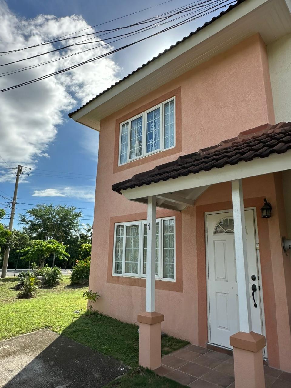Cozy-2-Bedroom-Townhouse-for-Rent-in-Long-Mountain-St.-Andrew-Jamaica First image of 1 Canella Place Lot 65 Long in Kingston 6, St. Andrew, Jamaica - property is For Rent