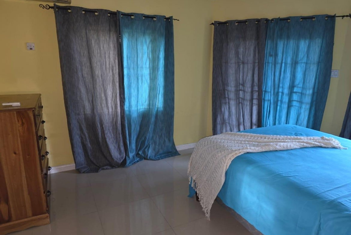 Sixth image of A202- Palm Close Rose Hall in SPOT VALLEY, St. James, Jamaica - property is For Rent